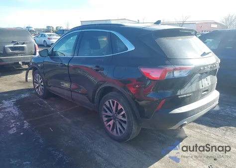 2021 Ford Escape Titanium z USA, uszkodzony, nr VIN 1FMCU9J90MUB23259